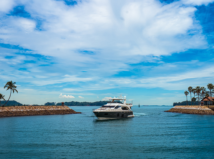 Yacht entering Sentosa Cove