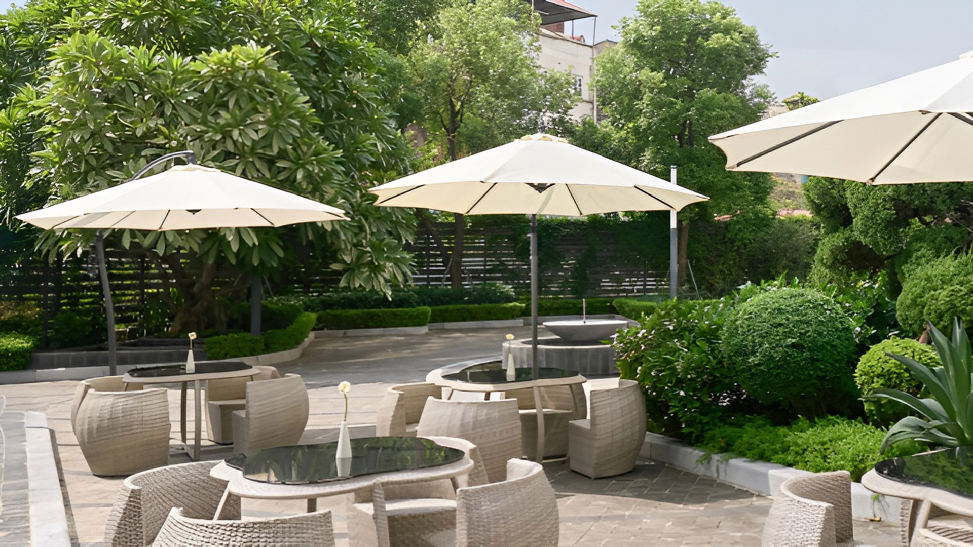 Outdoor garden seating at PARKROYAL Serviced Suites Hanoi