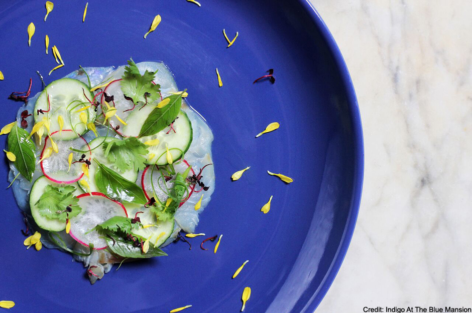  hamachi sashimi on blue plate