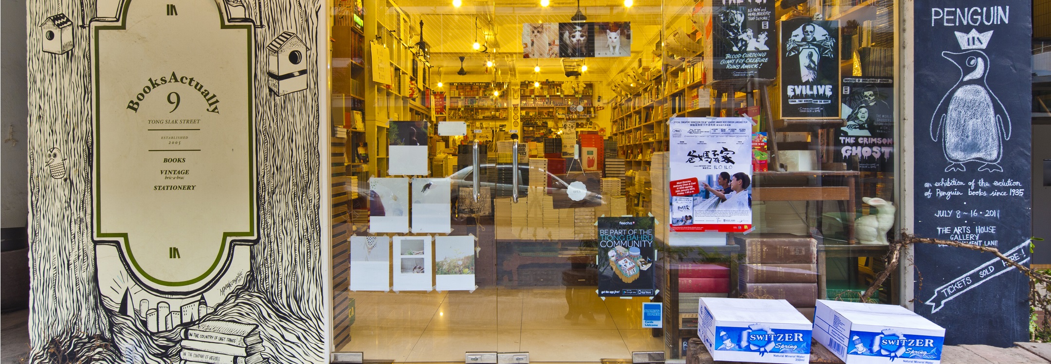 whimsically decorated exterior wall of books actually