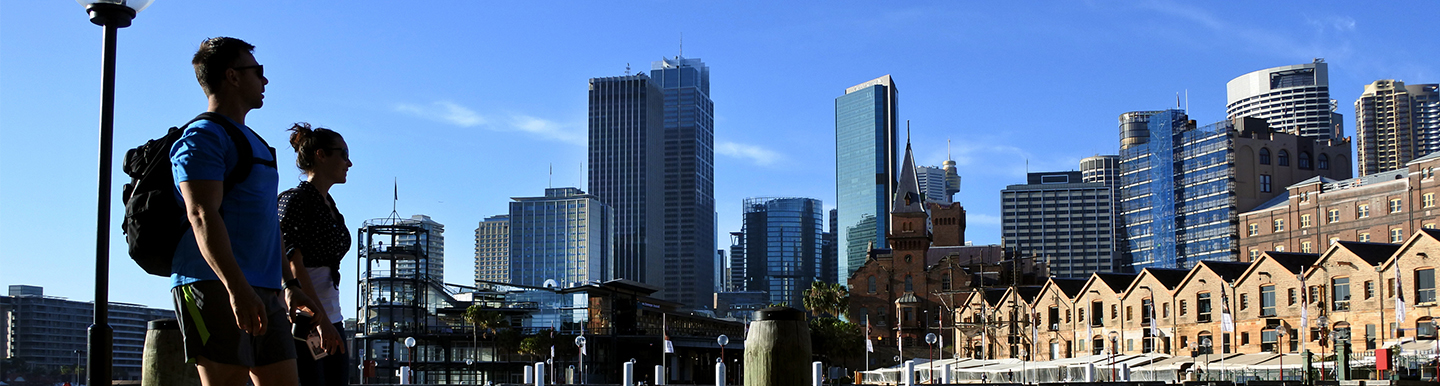 Couple strolling along Circular Quay in Sydney